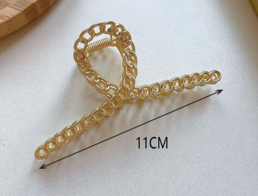 PINZA DE CABELLO DORADA 11CM